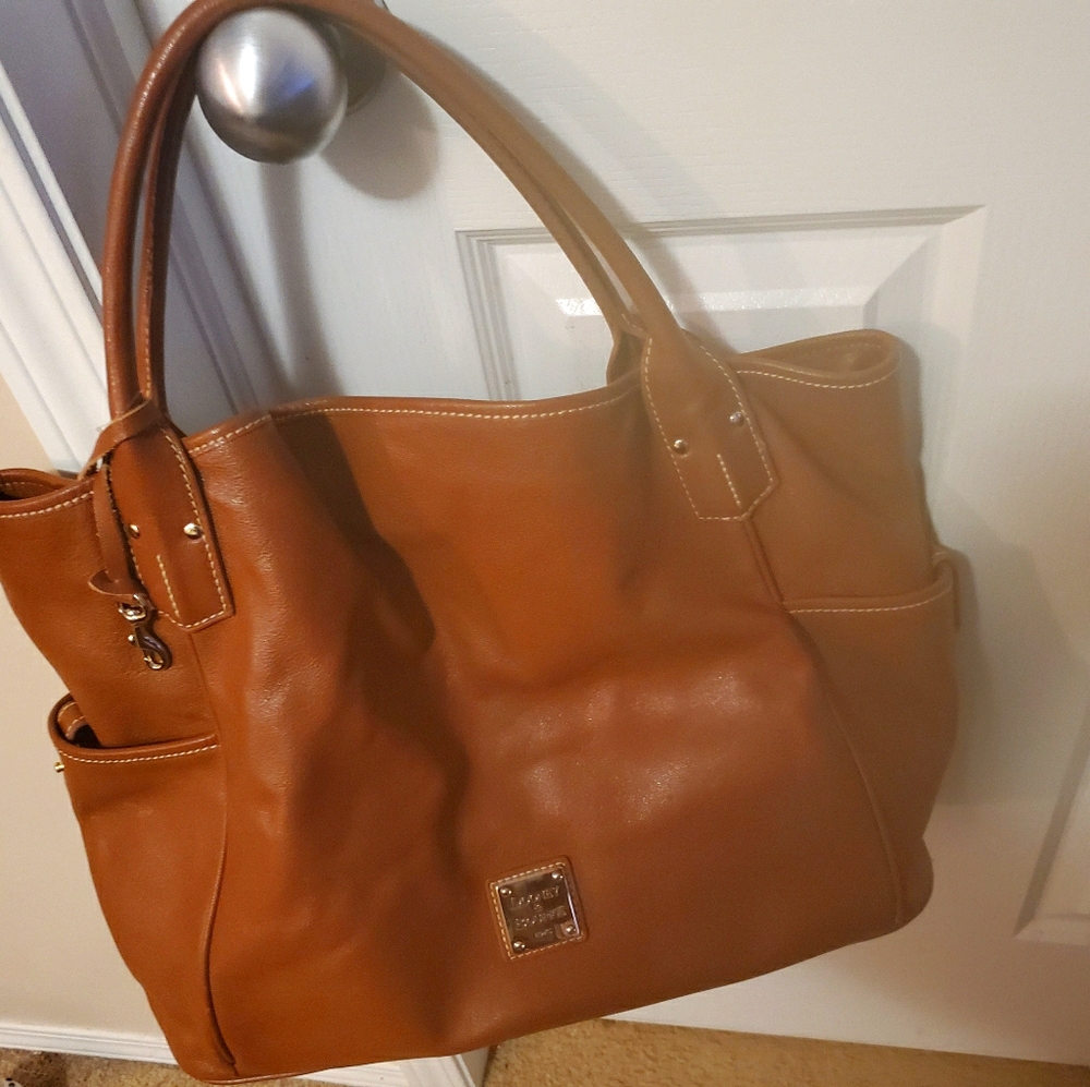 Dooney & Bourke hobo bag in brown.
